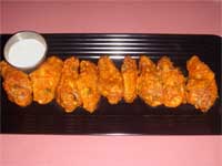 Plated Chicken Wings with Dipping Sauce Picture