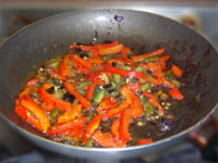 Frying the Vegetables for Mahi - Mahi Picture