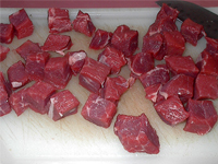 Cutting the Beef into Squares Cutting the Beef into Squares Picture